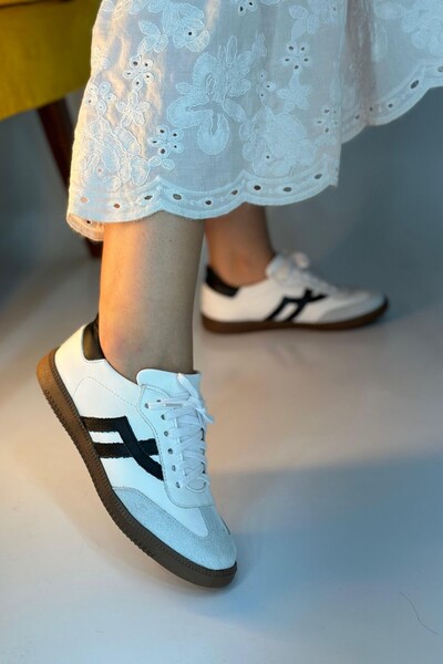 Foto Tenis Caio