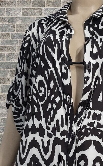 FotoCamisão abertura frontal com gola detalhe na manga,CM299