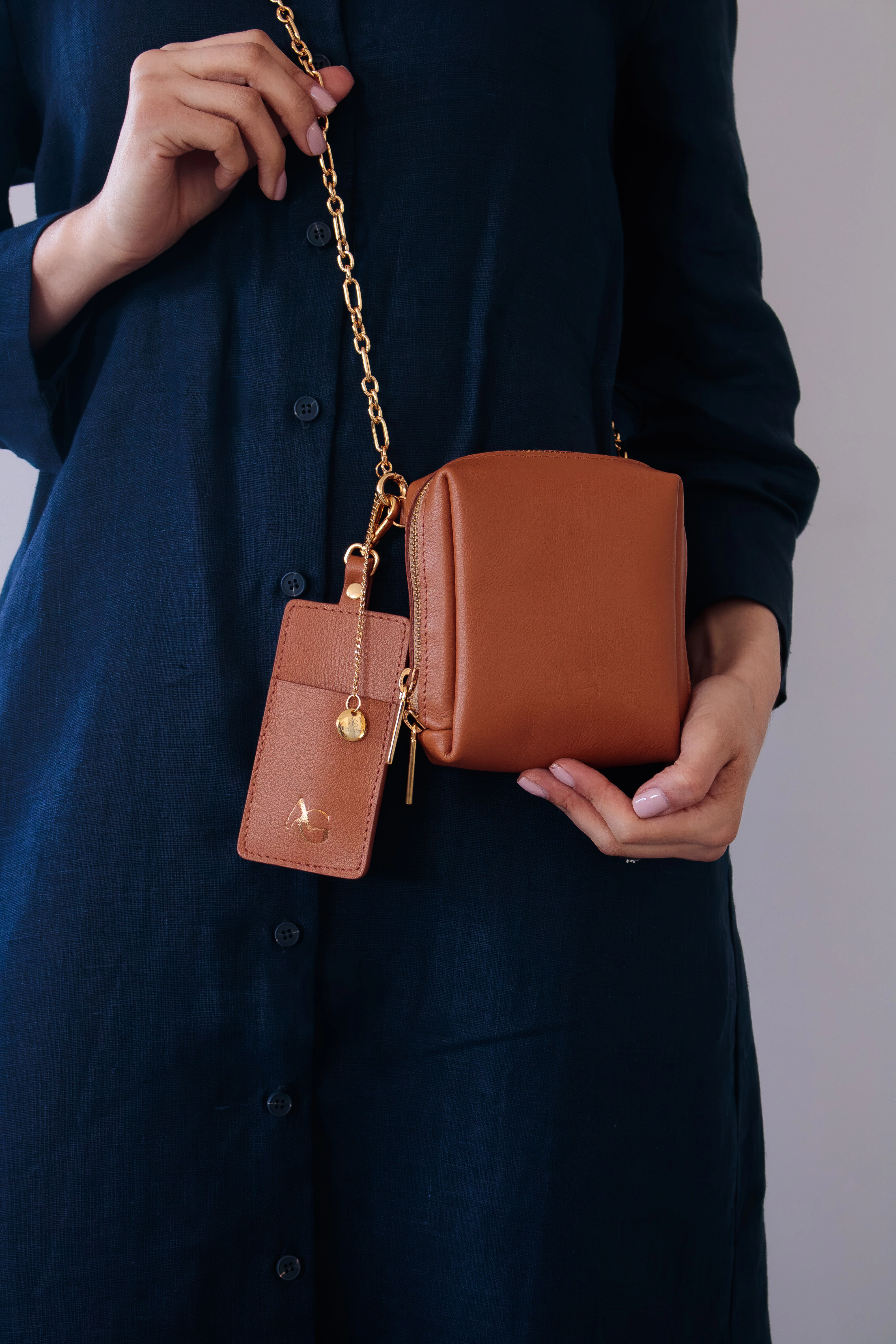 Foto Mini Bags em Couro Legítimo com Chaveiro Porta Batom Removível
