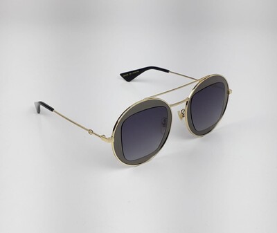 FotoÓculos de Sol Gucci GG0105S Redondo Preto