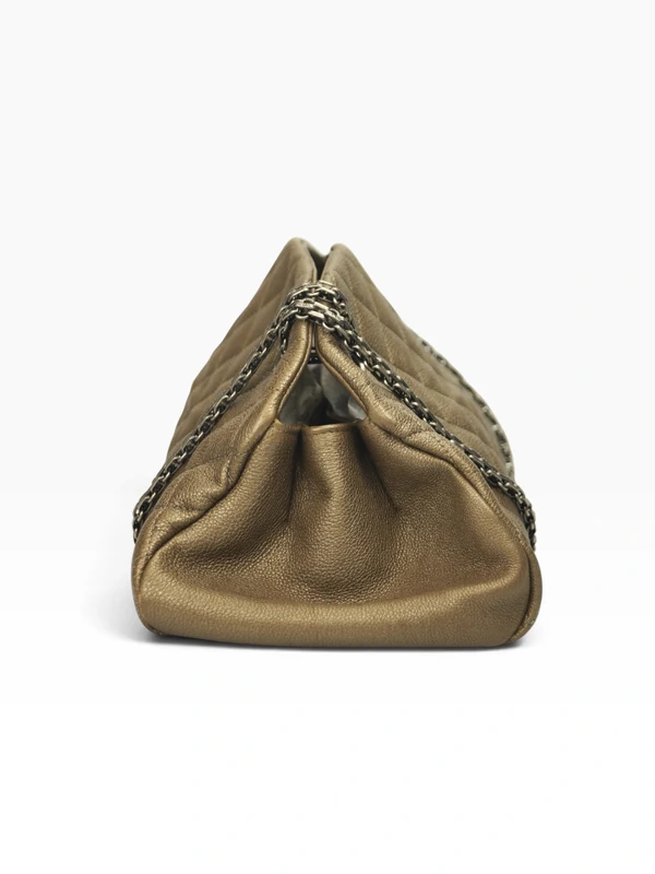 Bolsa Chanel Just Mademoiselle Caviar Bronze