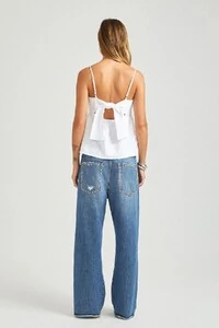 Calça loose cropped tachas