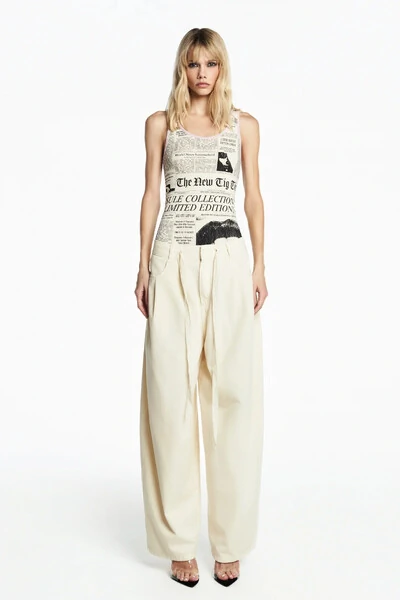 Foto Calça pregas perna ampla sarja