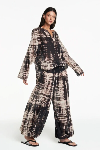 FotoCalça pala drapeada elástico tie dye