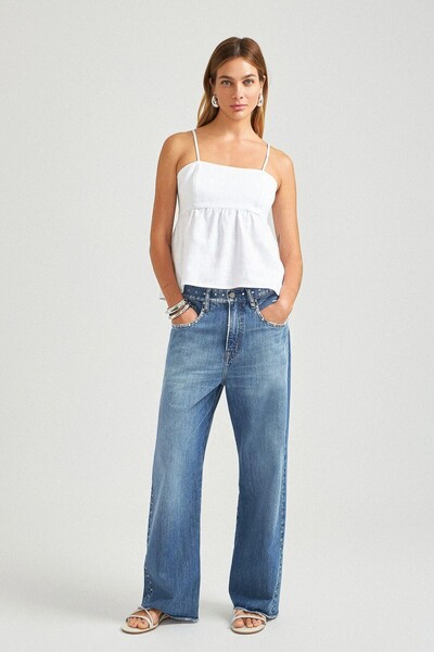 Foto Calça loose cropped tachas