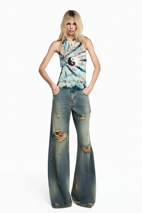 Calça Jeans Amarelada Rasgos Flare Cintura Baixa