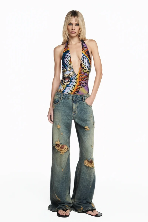 Calça Jeans Amarelada Rasgos Flare Cintura Baixa
