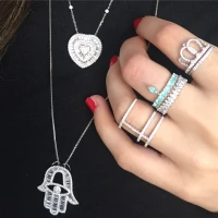 Anel meia aliança cravejada com gota turmalina prata925