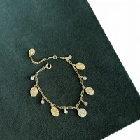 pulseira medalhas de nossa senhora e sao bento ouro18k