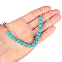 Colar gargantilha boho fio de couro marrom com bolinhas turquesas ouro18k