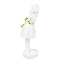 Escultura Decorativa Menina com Laço Dourado