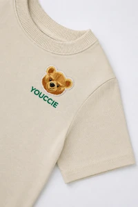 T-shirt bege com patch