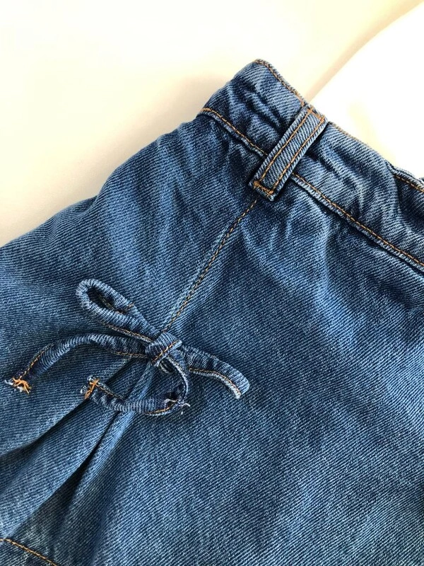 Short Saia Jeans com Laço