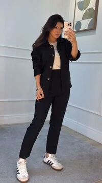 Blusa De Malha Fabricia Mangas Curtas Com Recortes
