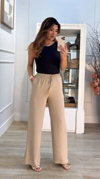 Calça Pantalona Pala Larga Franzida Com Amarração Luiza Bolsos Frontais