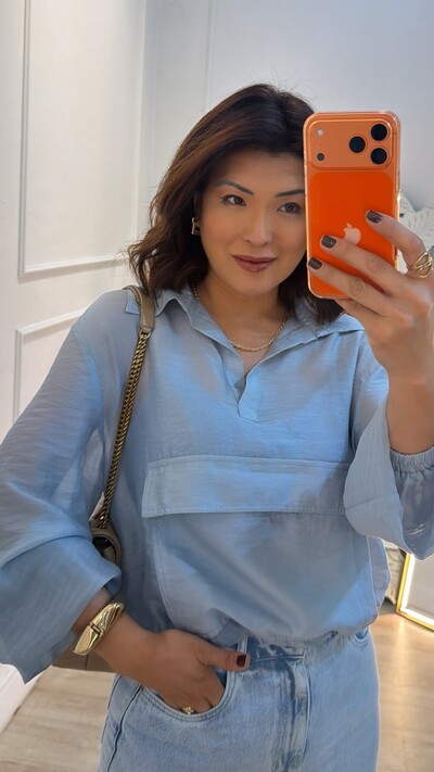 Foto Blusa Translucida Maxi Bolso Frontal Pati Elástico Nos Punhos E Barrado