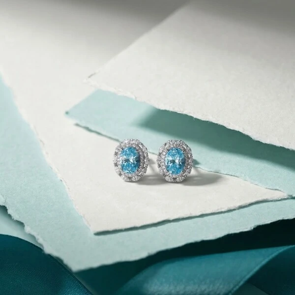 Brinco Oval Zircônia Água Marinha Isa Prata 925