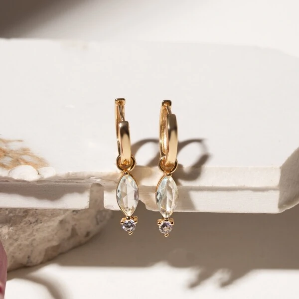 Argola Ear Bling com Charm Navete Cristal Topázio Azul e Zircônia Branca | Liga Metálica Banho Ouro