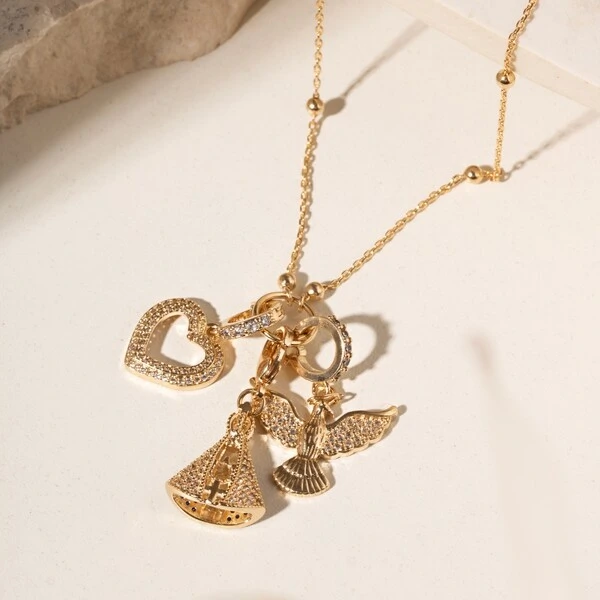 Colar Patuá com Charms Nossa Senhora Aparecida, Divino Espírito Santo e Coração Vazado com Zircônias