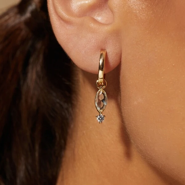 Argola Ear Bling com Charm Navete Cristal Topázio Azul e Zircônia Branca | Liga Metálica Banho Ouro