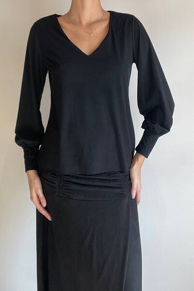 Foto Blusa Pouco Bufante Suede