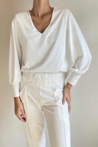 Foto Blusa Pouco Bufante Suede