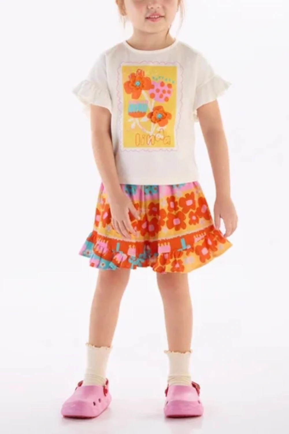 FotoConjunto blusa malha e short em malha digital Três e Já