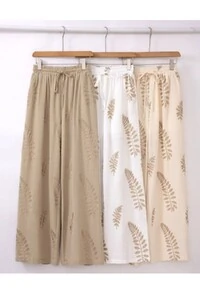 Calça feminina bordado folhas Kwi