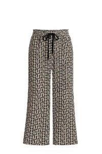 Calça em malha estampa fendi Kwi