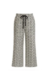 Calça em malha estampa fendi Kwi