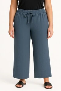 Calça pantalona em malha com amarração Kwi