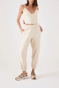 Calça bolsos Dress to