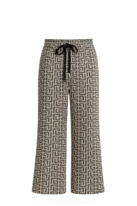 Calça em malha estampa fendi Kwi