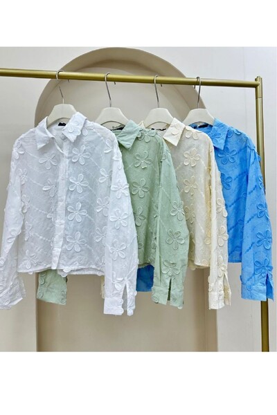 FotoCamisa feminina em revelo floral Kwi