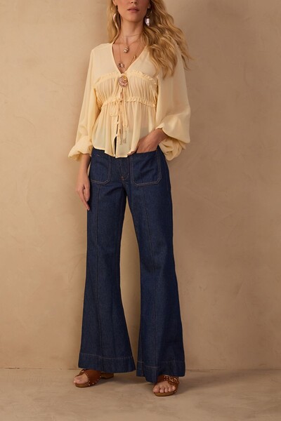 Foto Calça jeans flare bolso Dress to
