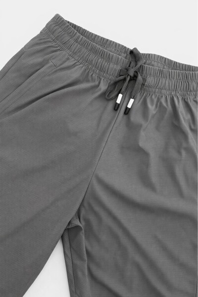 FotoCalça esportiva masculina com cordão Kwi