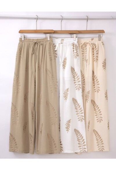 FotoCalça feminina bordado folhas Kwi