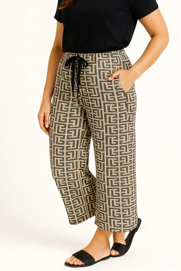 Calça em malha estampa fendi Kwi