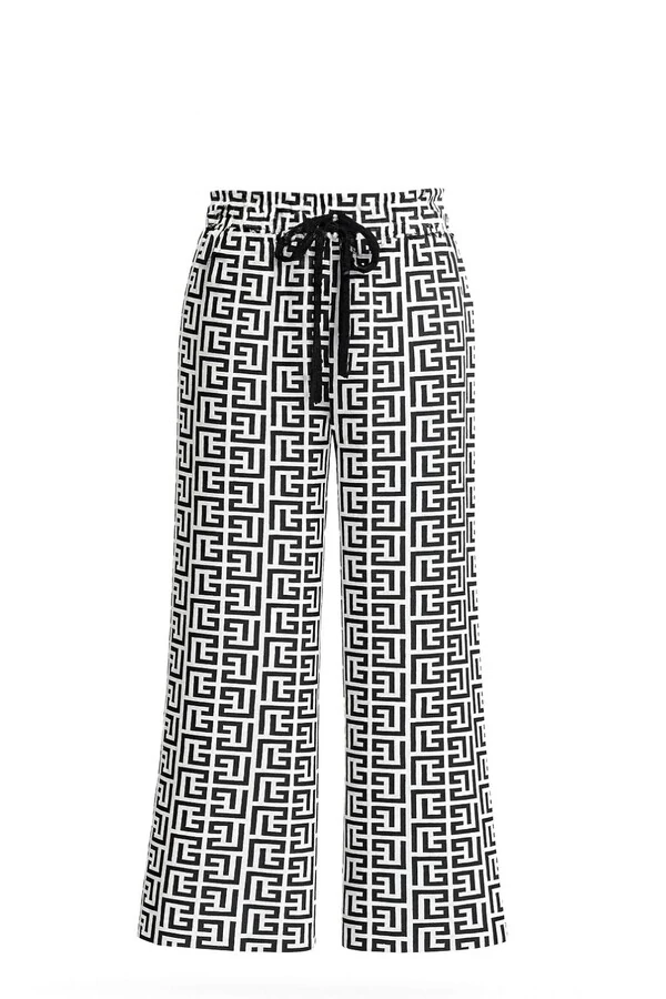 Calça em malha estampa fendi Kwi