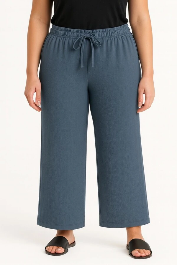 Calça pantalona em malha com amarração Kwi