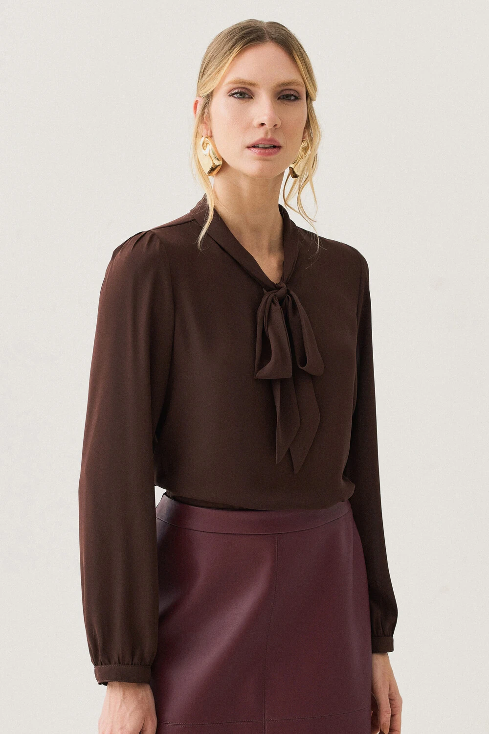 FotoBlusa Manga Longa Punho Gola Dobrada de Laço