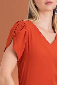 Blusa manga aberta botão forrado