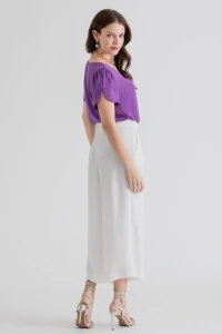 Blusa manga aberta botão forrado