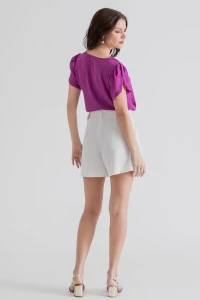 Blusa manga aberta botão forrado