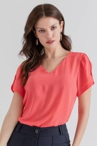 Blusa manga aberta botão forrado