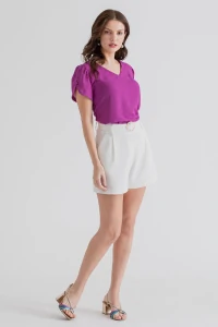 Blusa manga aberta botão forrado
