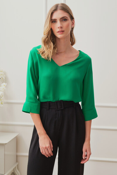 FotoBlusa manga 3/4 fenda decote v