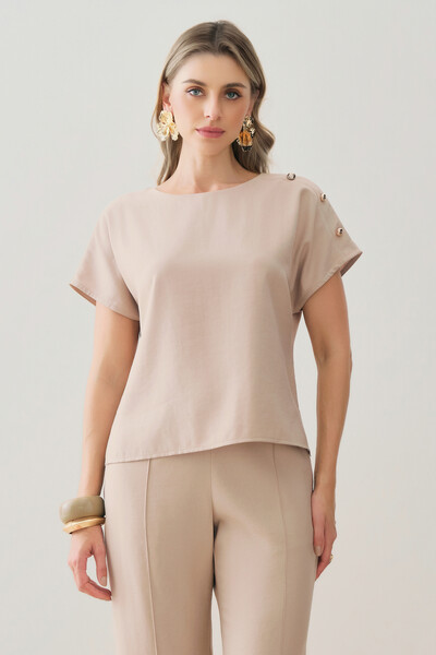 Foto Conjunto de Blusa Assimétrica Manga Morcego Gold Triple e Calça Reta Nervura