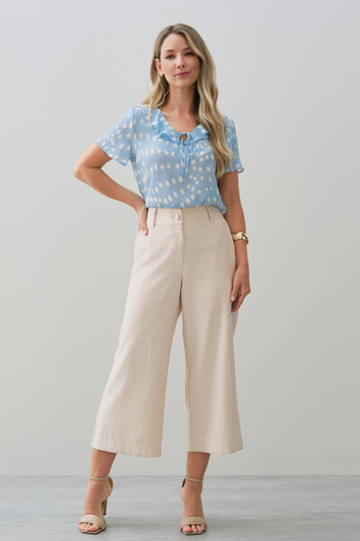 FotoBlusa Poa Decote V Babado Laço