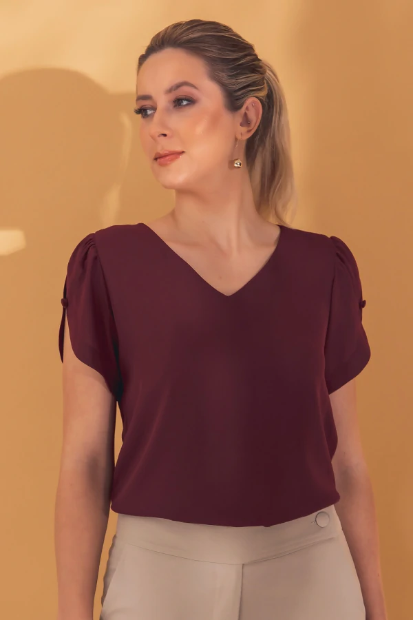 Blusa manga aberta botão forrado